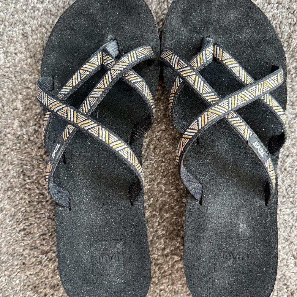 Teva Black and Gold Crisscross Sandals